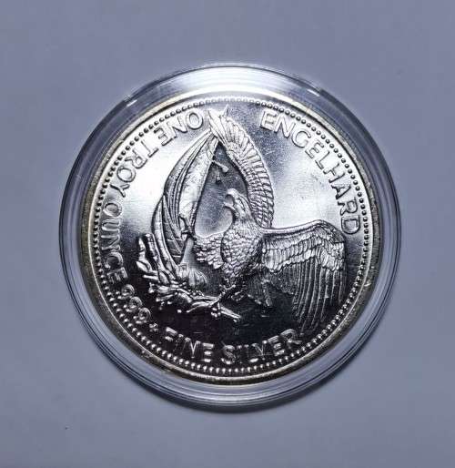 1OZ SILVER ROUND. ENGELHARD. THE AMERICAN PROSPECTOR 1985. MIN STATE IN SEALED PLASTIC.