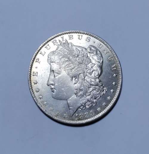 USA 1883 SILVER MORGAN DOLLAR. MINT STATE WITH BAG MARKS.