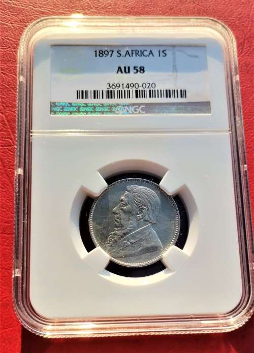 ZAR 1897 1 SHILLING NGC AU58. HIGH GRADE