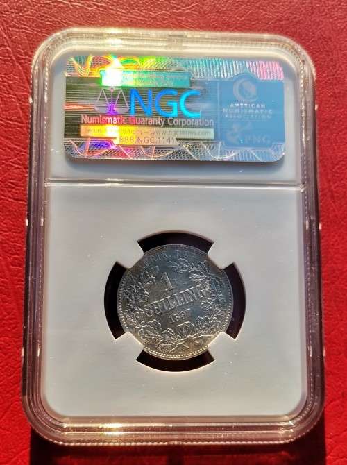 ZAR 1897 1 SHILLING NGC AU58. HIGH GRADE