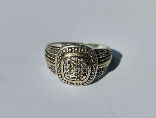 SILVER AND GOLD RING. STAMPED 925 AND 375 (GOLD). WEIGHT: 5.90 GRAMS.