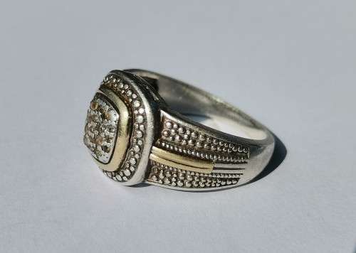 SILVER AND GOLD RING. STAMPED 925 AND 375 (GOLD). WEIGHT: 5.90 GRAMS.