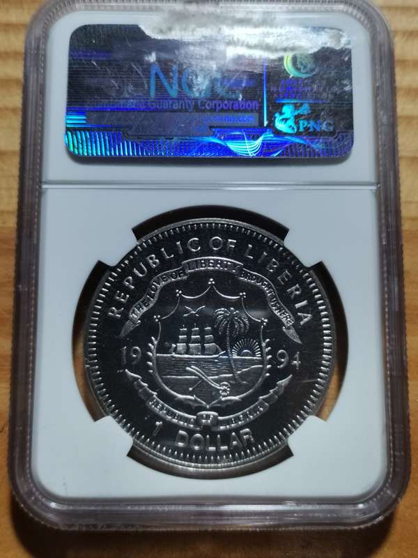 1994 LIBERIA 1 DOLLAR MANDELA MEDALLION. MS65. NGC. BEAUTIFUL.