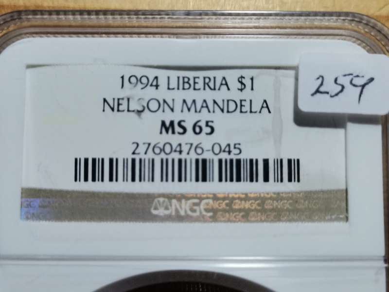 1994 LIBERIA 1 DOLLAR MANDELA MEDALLION. MS65. NGC. BEAUTIFUL.
