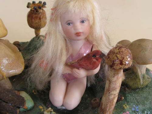 3 miniature fairy dolls in a mushroom garden (larger than 1:12" scale)
