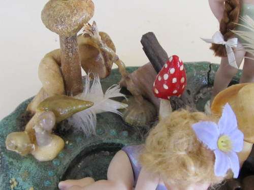 3 miniature fairy dolls in a mushroom garden (larger than 1:12" scale)