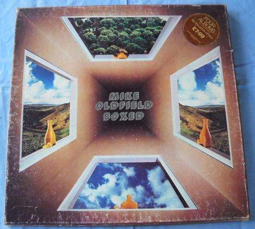 MIKE OLDFIELD- BOXED 4 LP SET-3 OF THE 4 LPS ONLY-WITH INFORMATION BOOK-EXCELLENT VINYLS