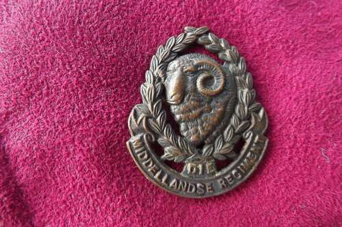 SA Army Middelandse Regiment Collar Badge.Worn 1935-1957.Both lugs.Blackened