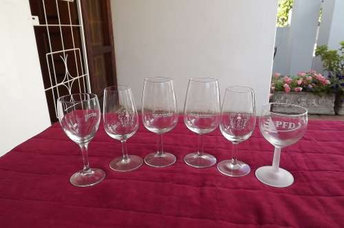 Lot of 6 different Logo wine  glasses in good condition.
