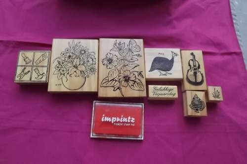 Set of 8 different stamps + pigment pad for craft work.New condition