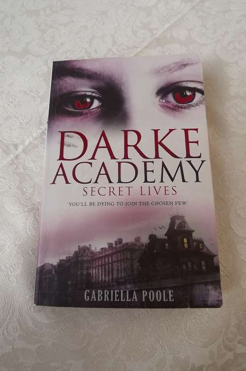 Book - DARKE ACADEMY Secret Lives by Gabriella Poole. They will die to join the chosen few.