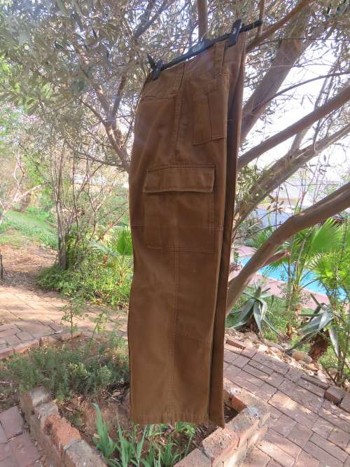 SADF nutria combat pants close with  buttons on front.Size 32.Good condition