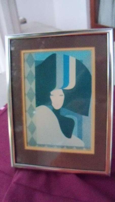 Modern picture framed and in good condition