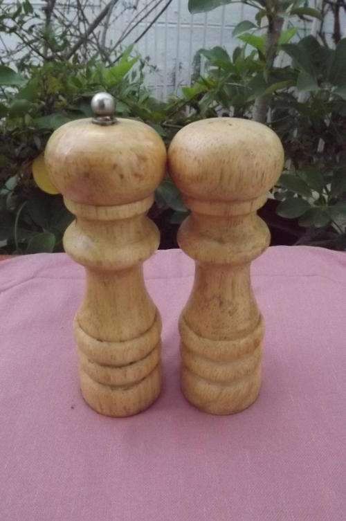Wooden pepper grinder and salt pot