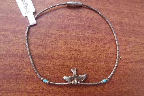 Silver Bracelet with little silver bird.
