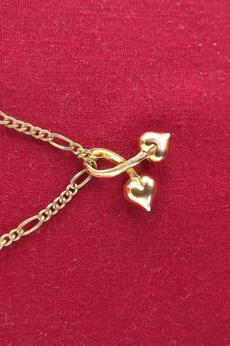 Gold colour chain with pendant