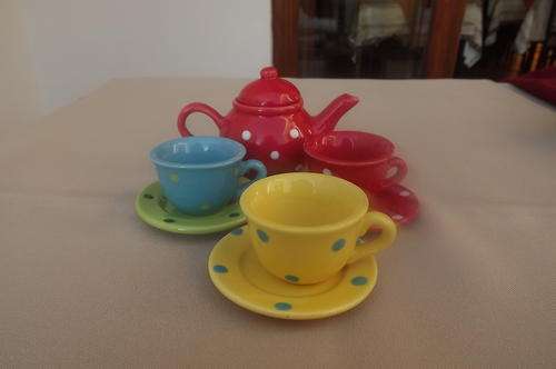 Miniature Porcelain Kettle and 3 cups and saucers