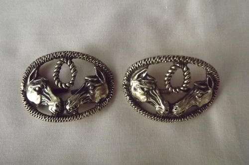 Set of Buckle Fronts with Horses in Brass