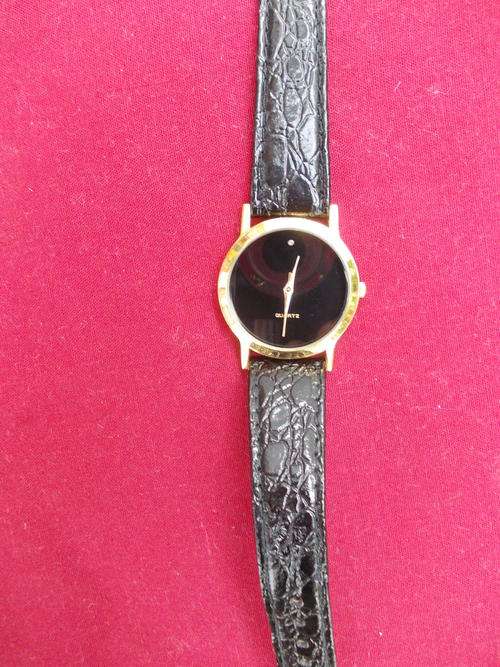 Attractive Black Face Ladies Watch Quartz with genuine Diamond as a 12