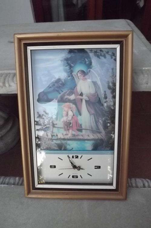 Framed Clock with 2 small children overseen by an Angle - 51.5x34cm - not working
