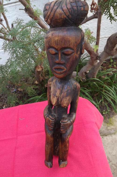 West African Wooden Statue - Thin crack at side - length of statue 34cm