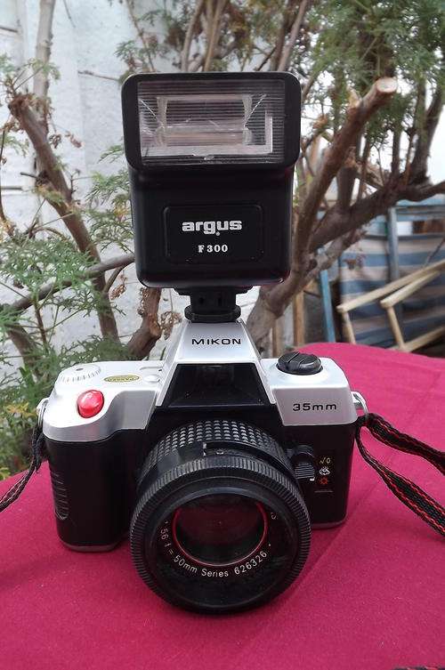Mikon 35mm Camera - 50mm Lens - looking good but not tested - Argus F300 Flash included