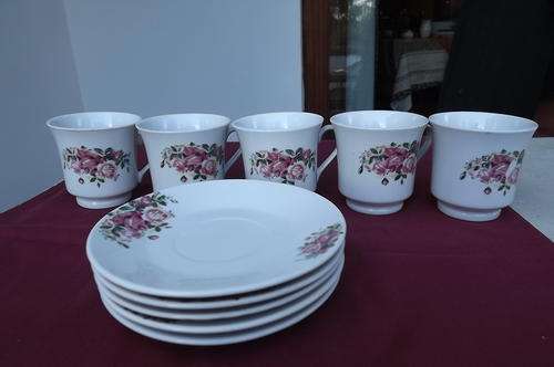 Set of 5 Floral Porcelain Cups & Saucers in very good condition