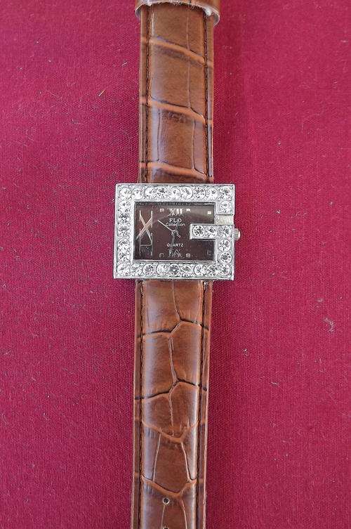 FLO Collection Ladies Quartz Watch in good condition - working - genuine leather strap