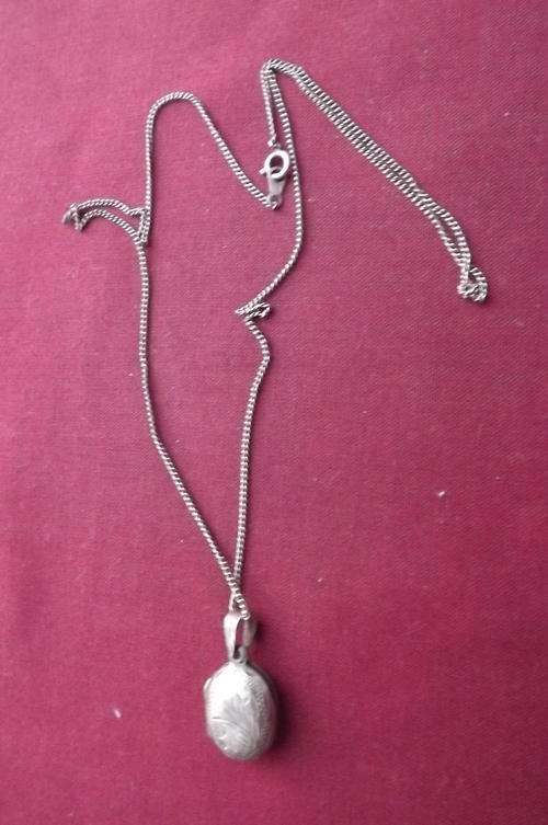 Silver Chain and Locket in good condition