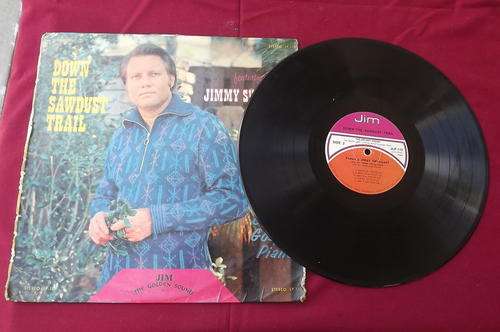 LP - Down The Sawdust Train - Jimmy Swaggart & His Golden Piano - in dust cover in good condition