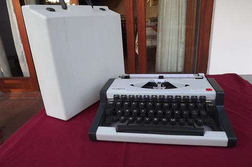 Olympia Traveller Portable Typewriter - good condition but needs a new ribbon and inside cleaning