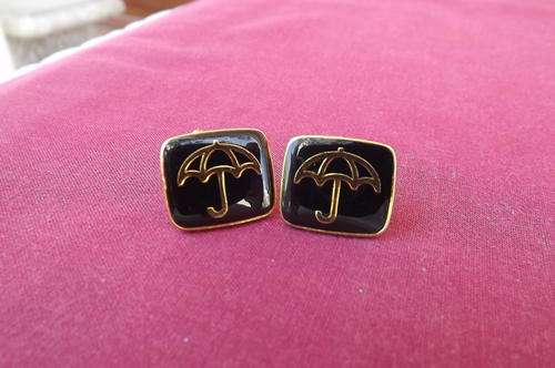 Pair of Black Santam Cufflinks with a Golden Umbrella - good condition