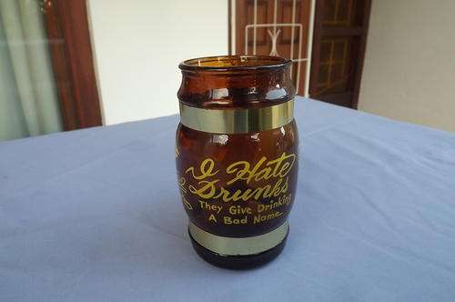 Brown Glass Beer Mug with Wooden Handle - "I Hate Drunks, they gave drinking a bad name" - as new