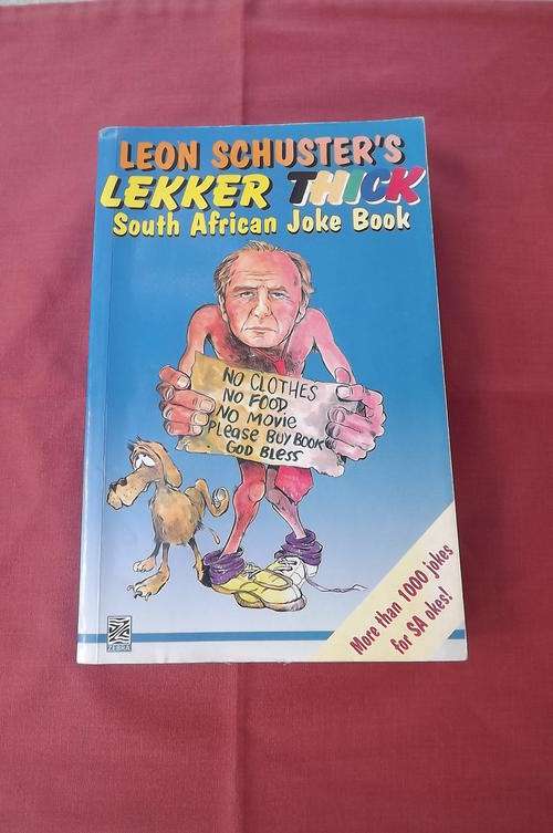 Book - Leon Schuster's Lekker Thick SA Joke Book - as new