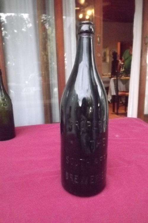 Old Heavy Green Beer Bottle - Property of The South African Breweries Ltd - height 27.5cm
