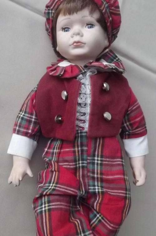 Porcelain Doll in Scottish Clothing- she lost a lower leg, if it's replaced she'll be perfect! 42cm