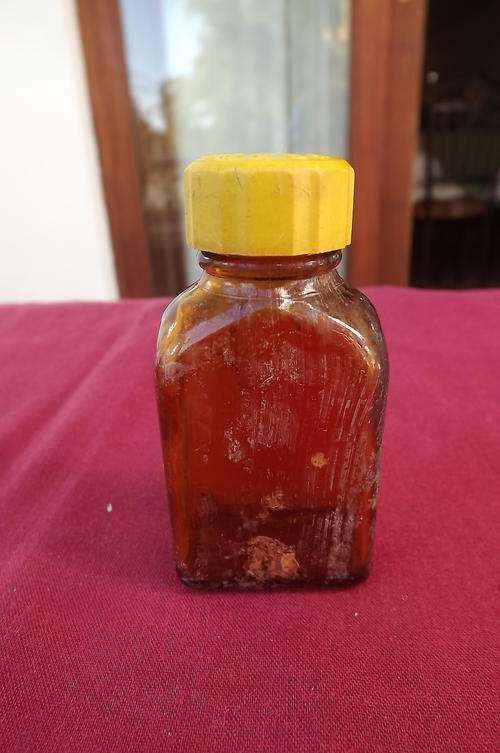 Vintage Fruitros Bottle in good condition with Cap - 7cm high
