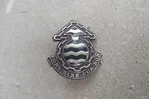 SA Army Ordinance Service Corps Cap Badge - 4.4x4cm in very good condition with screws and pins