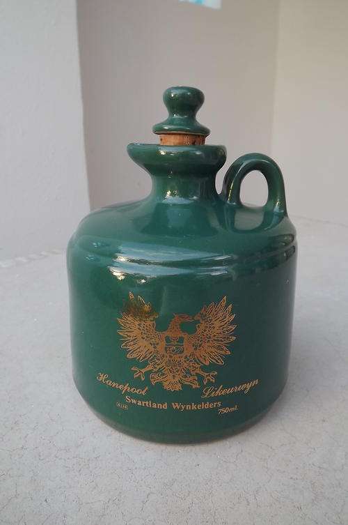 Dark green stoneware 750ml "Swartland Wynkelders" carafe with cork in.New condition.