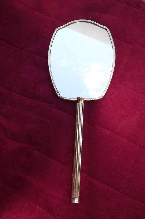 Antique dressing table mirror. Back covered with pretty silk fabric. Good condition. Length 30cm