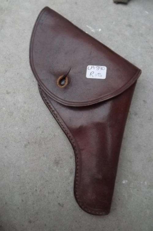 Brown leather pistol holster.Need stitching.Further in good condition.Length 15.5 cm