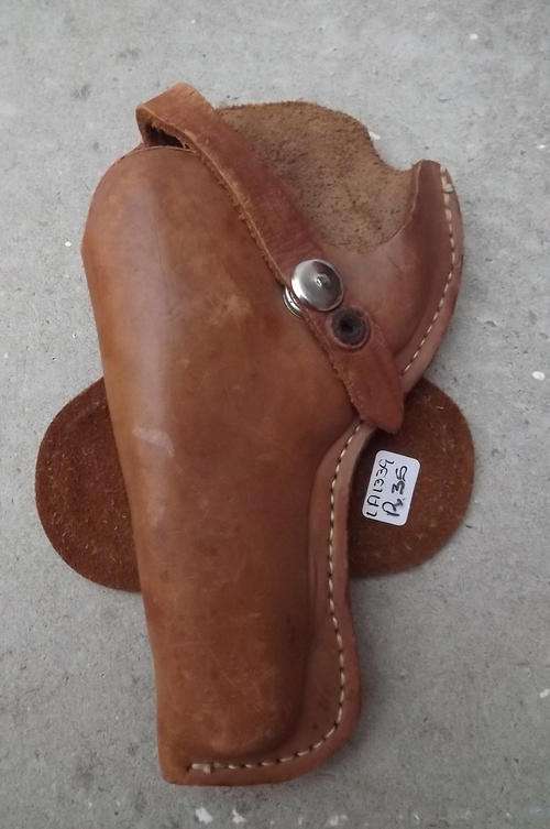 Firm tan leather holster 19cm long in very good condition