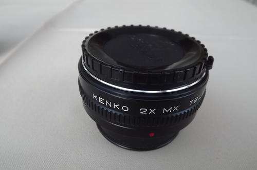 Kenko 2x Mx Teleplus MC4 lens in new condition with lens covers and storer.