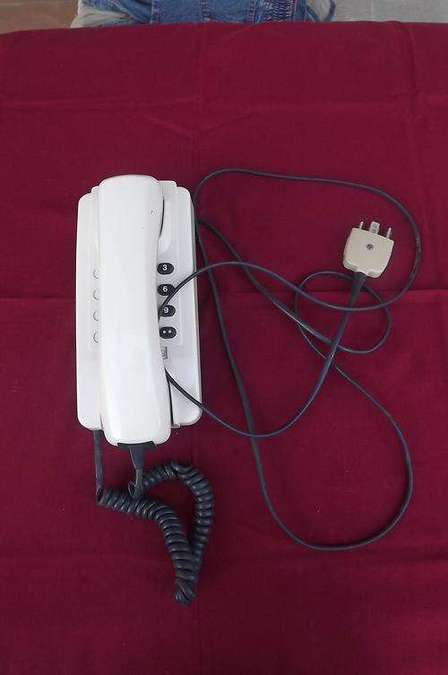 Beige colour push button telephone.Good exterior condition