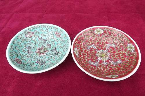 Set of 2 small porcelain,very pretty Chinese bowls.One in turquoise floral and red floral.Made in Ch