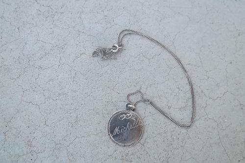 Silver 925 thin chain and round pendant with word Michelle encraved