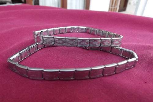 Pair of vintage men's metal sleeve garters.Stretch.As new