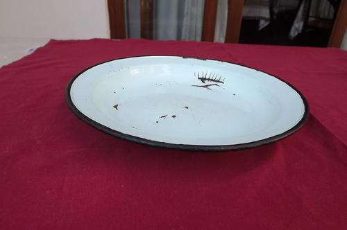 Antique light blue enamel plate.Diameter 25cm.