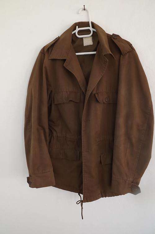 S.A Army Nutria Field dress jacket size small.Used a lot but in fine condition