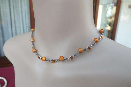 Stunning Magic Glow necklace by "With Love from Africa".Length 36 cm